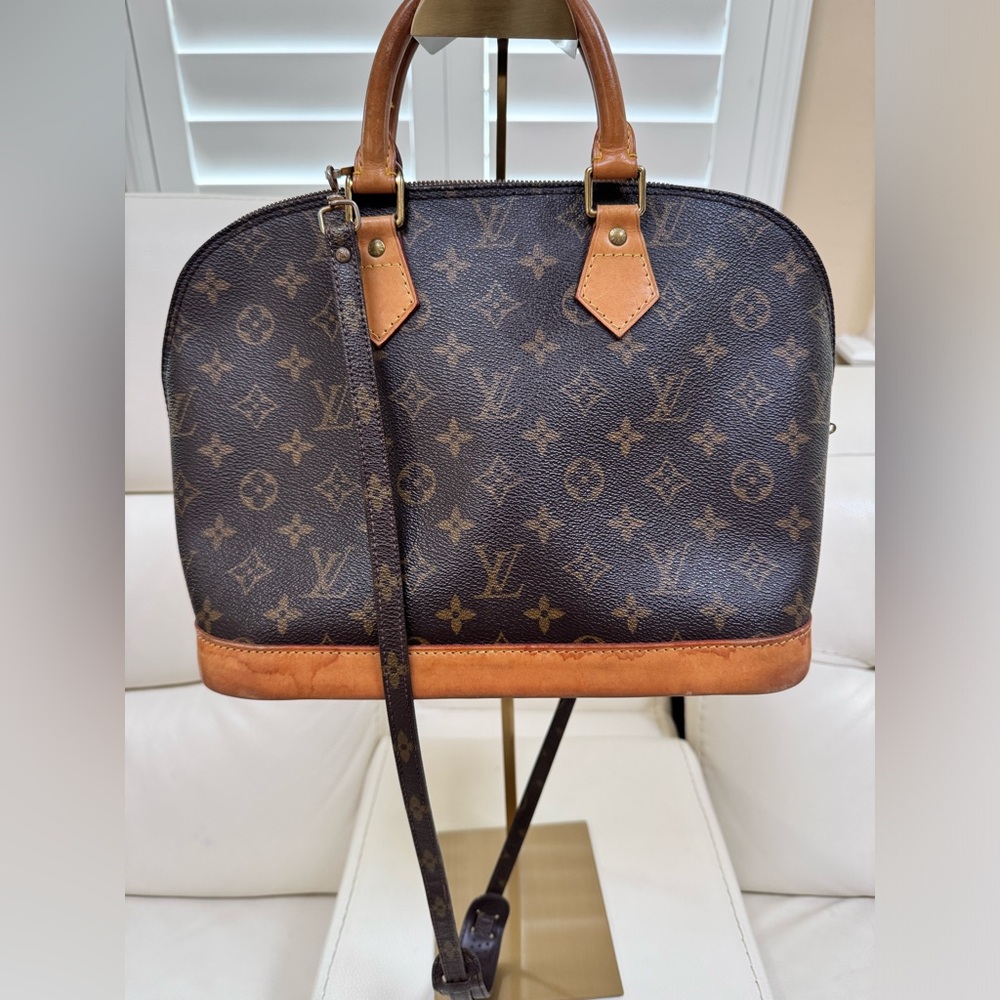 Louis Vuitton vintage pre-loved Alma PM with monogram crossbody strap